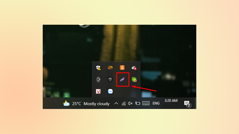 Nhấn chọn biểu tượng lông vũ trên thanh Taskbar