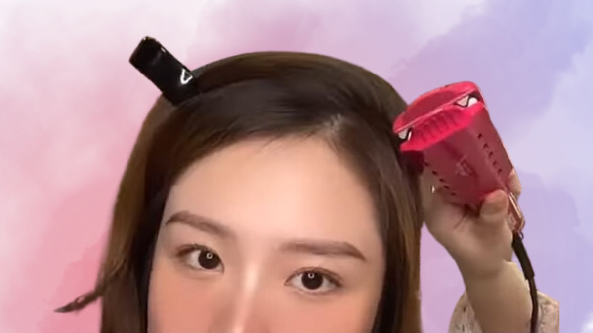 Cách uốn phồng chân tóc bằng máy dập xù bước 1